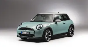 Turkusowy Mini Cooper S z białym dachem. Stylowy, miejski samochód, który zbiera świetne mini cooper opinie.