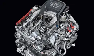 Przekrój silnika Audi V8 FSI z widocznymi tłokami, zaworami i układem wtrysku paliwa.