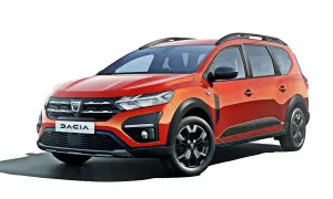 Pomarańczowy Dacia Jogger, marka samochodu na d, z relingami dachowymi i czarnymi dodatkami.