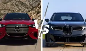 Czerwony mercedes sedan kontra ciemny BMW. Dwa luksusowe auta na tle górskiego krajobrazu i nieba.