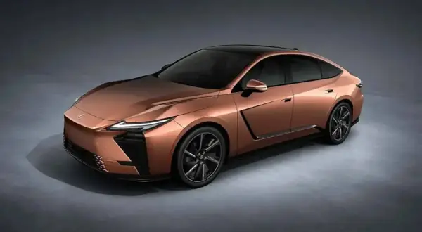 Miedziany Lexus ES 2026 z czarnym dachem i futurystycznymi światłami.
