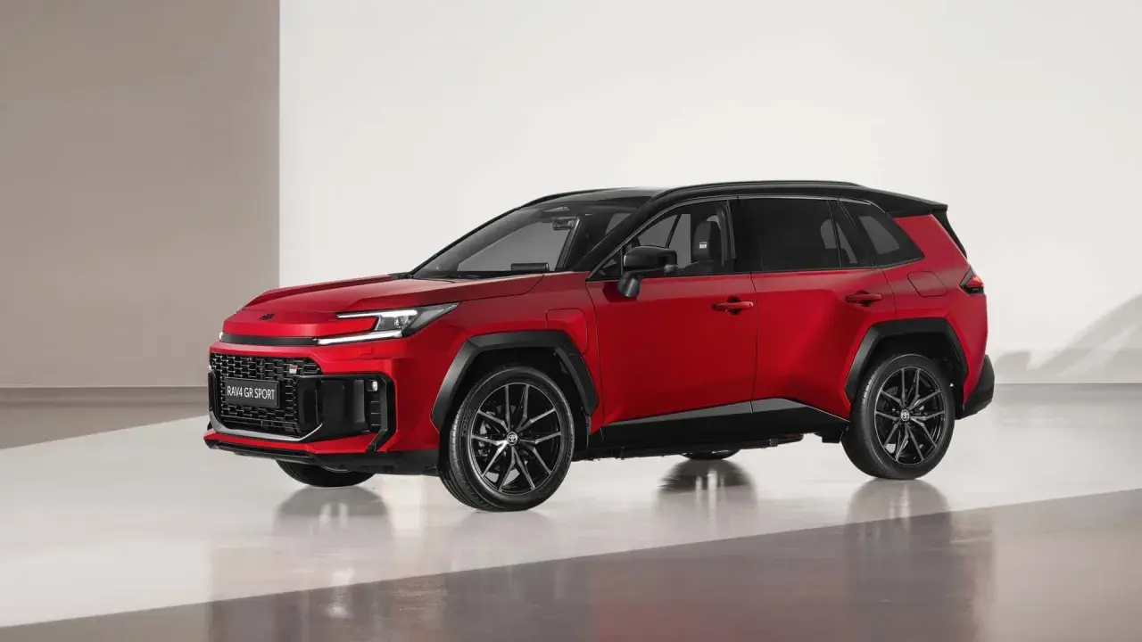 Czerwony SUV Toyota RAV4 GR SPORT, jeden z wielu modeli Toyoty, prezentuje sportowy design z czarnymi akcentami i felgami.