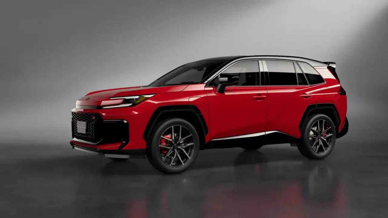 Czerwony SUV z czarnym dachem, przypominający sportowe modele Toyoty, prezentuje się dynamicznie.