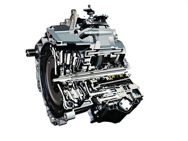 Przekrój nowoczesnej sekwencyjnej skrzyni biegów z widocznymi elementami mechanicznymi i hydraulicznymi.