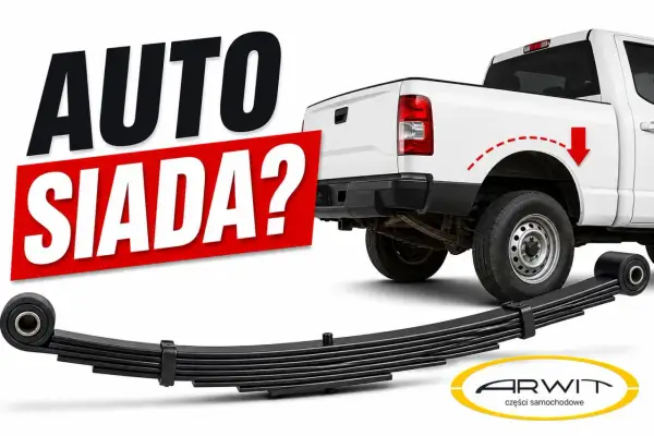 Biały pickup z napisem "AUTO SIADA?". Obok leży resor piórowy, sugerując problem z zawieszeniem.